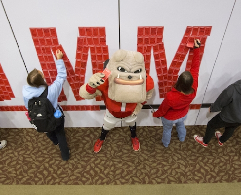 Hairy-Dawg-with-Commitment-Sign